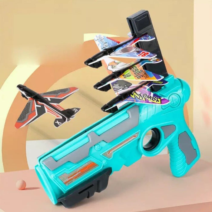 Pistol de jucarie, lansator de avioane, cu 4 avioane si incarcare manuala, pentru copii de peste 3 ani